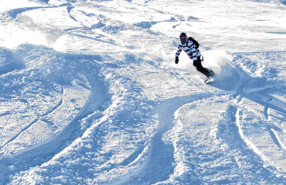 Skier on the snowy slopes of Livigno
